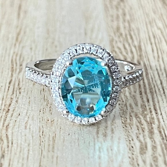 Oval Simulated Light Blue Topaz Halo Ring - 925 Sterling Silver - Picture 1 of 5